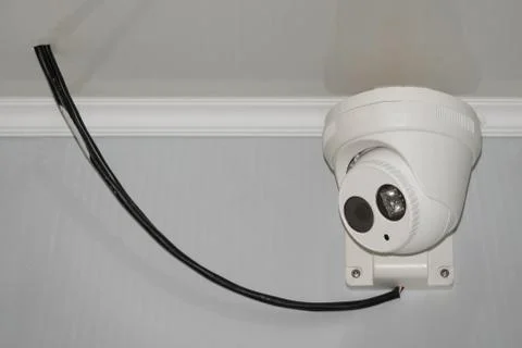 Security CCTV camera on the ceiling. Record video both day and night. Stock Photos