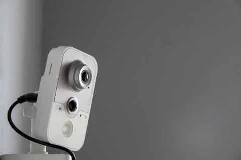 Security CCTV camera on the ceiling. Record video both day and night. Stock Photos