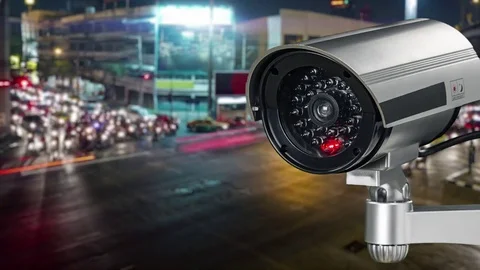 A Security CCTV camera has focus and recording a lot of car on the road Stock Footage 83065803