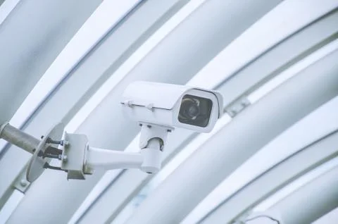 Security, CCTV camera operating inside a station or department store and office Stock Photos