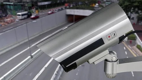 Security CCTV camera or surveillance system with road highway Video stock 82959646