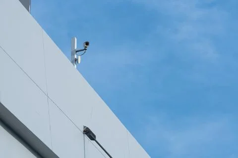 Security CCTV camera or surveillance system in office building 库存照片
