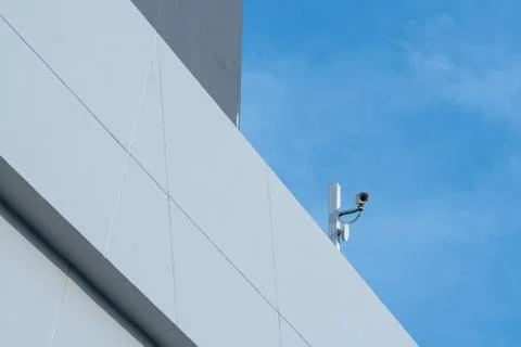 Security CCTV camera or surveillance system in office building Foto stock