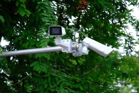 Security CCTV camera surveillance system in the park Stock Photos