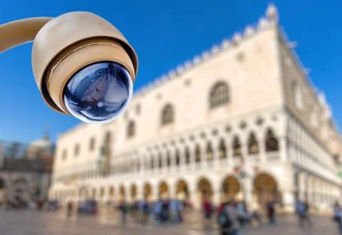 Security CCTV camera with touristic site on blurry background Stock Photos