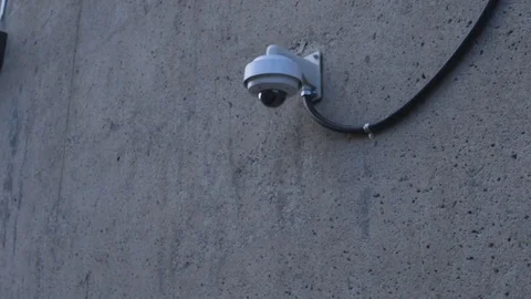 Security CCTV Camera on wall - camera orbit around Stock Footage 85369682