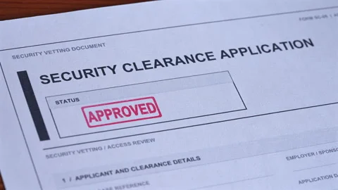 Security Clearance Application Approved Stamp Coming Down On Form Stock Footage 345636547