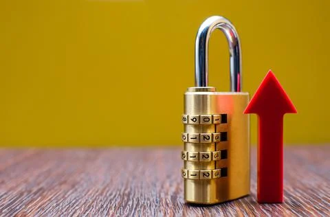 Security, combination lock and up arrow as a symbol of increased security, co Stock Photos