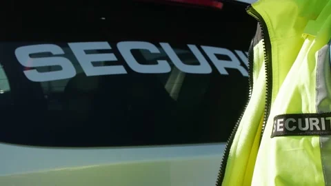 Security company car with a text of security written on the window Stock Footage 153843299