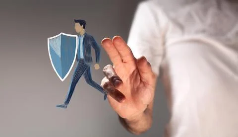 Security concept businessman with shield Stock Photos