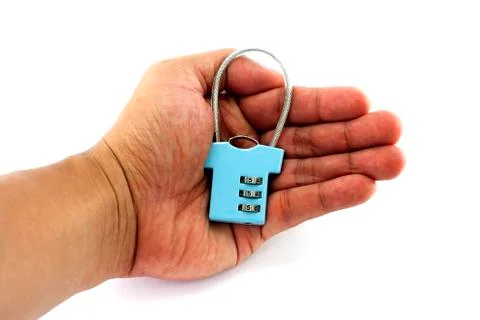 Security concept with locked-key on one hand. Stock Photos