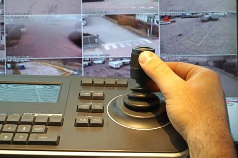 Security control room with keyboard and joystick to remove   cameras Stock Photos