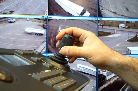Security control room with keyboard and joystick to remove   cameras Stock Photos