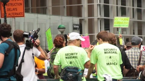 Security Detail at Global Warming Protest Stock Footage 54583349