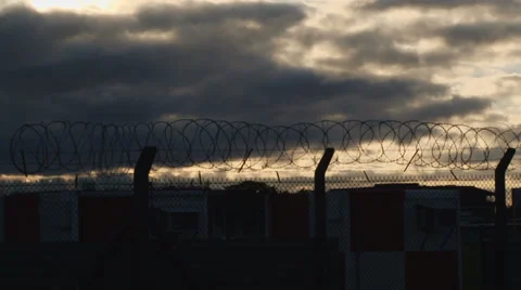 Security fench, dark sky -  HD 스톡 동영상 37572214