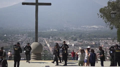 Security Forces and Tourism Taking Pictures at Anitgua Viewpoint Stock Footage 323494305
