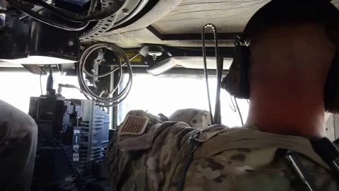 Security Forces soldiers sitting in armored personnel vehcile in Nigeria Stock Footage 85019724
