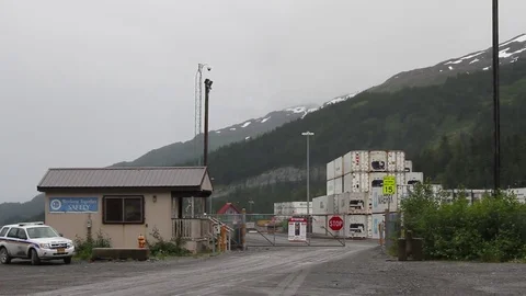 Security Gate Closing-static with mtns in BG Whittier Alaska Video stock 70001614