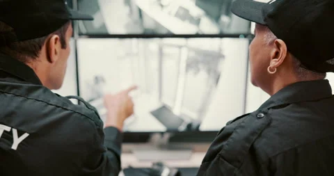 Security guard, back and screen with surveillance of robbery for safety breach Stock Footage 303714174