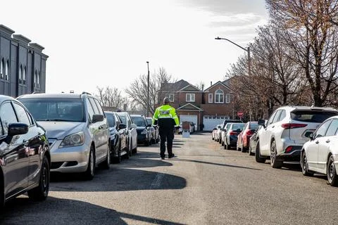 Security guard conducting access control and traffic control Stock Photos