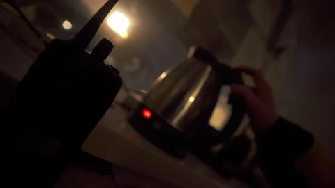 A Security Guard Is On Duty At Night Making A Pot Of Tea 動画素材 238752846