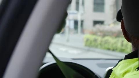 Security guard inside security car on patrolling and waiting for orders Stock Footage 153843434