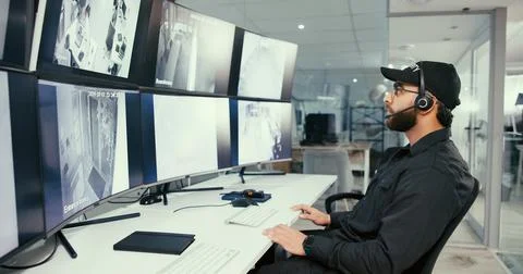 Security guard, man and computer in control room, inspection for video surv.. Stock Photos