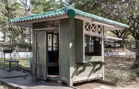 Security guard olive green booth (Guardhouse) in public park. Stock Photos