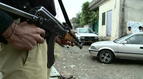 Security Guard outside Osama Bin Laden's House in Abbottabad, Pakistan Stock Footage 4899953