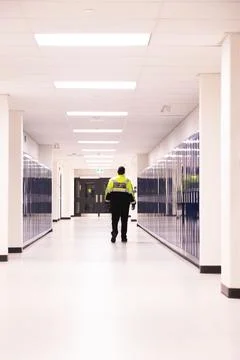 Security guard patrolling at school Stock Photos