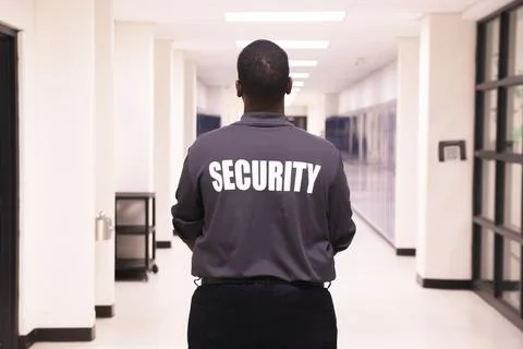Security guard patrolling at school Stockfoto's