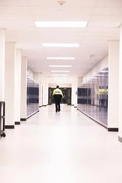 Security guard patrolling at school Stockfoto's