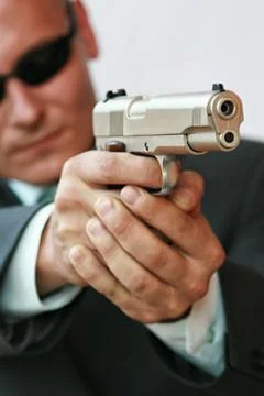 Security guard with pistol Foto stock