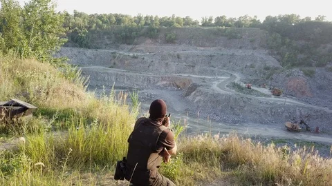 The security guard protects the quarry and trains to shoot targets. Stock Footage 94992012