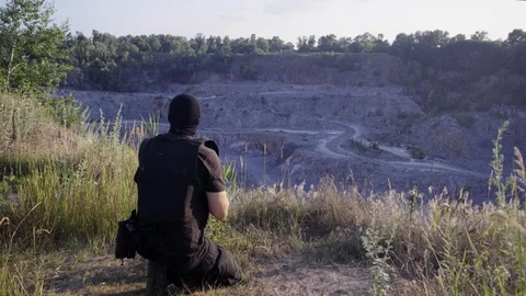 The security guard protects the quarry, inspects the territory Stock Footage 95169978