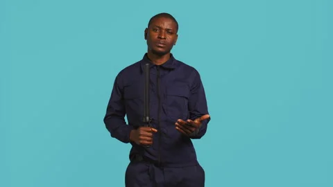 Security guard smacking hand with baton, intimidating suspects Stock Footage 277959823