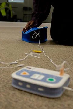 Security guard training for  CPR first aid with the AED. Stockfoto's