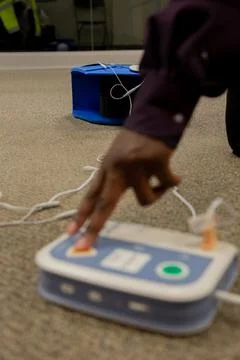 Security guard training for  CPR first aid with the AED. Stockfoto's
