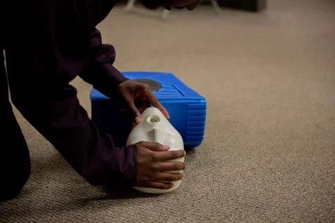 Security guard training for  CPR first aid with the AED. Stock Photos