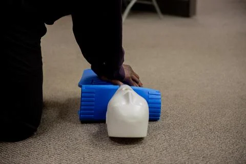 Security guard training for  CPR first aid with the AED. Stock Photos