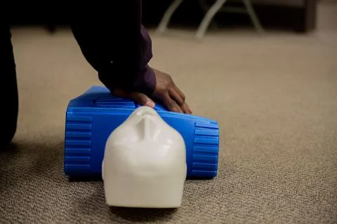 Security guard training for  CPR first aid with the AED. Stock Photos