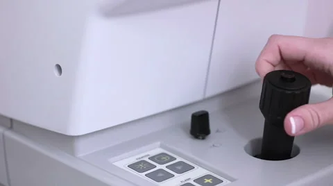 Security guard using joystick, remote for scanning retina to give access to Stock Footage 68416872