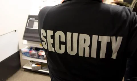 Security guards are learning how to use fire alarm panel Stock Photos
