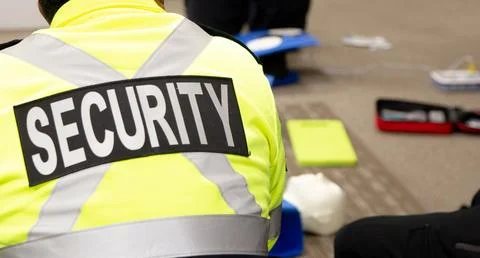 Security guards are learning how to use fire alarm panel Stock Photos