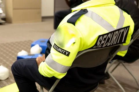 Security guards are learning how to use fire alarm panel Stock Photos