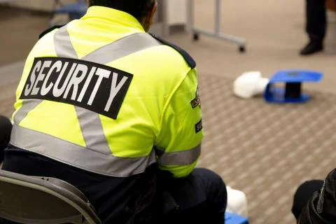 Security guards are learning how to use fire alarm panel 스톡 사진