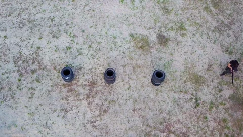 The security guards are trained to shoot guns at the shooting range, aerial Stock Footage 94989007