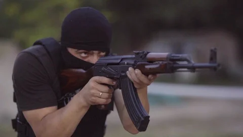 The security guards are trained to shoot guns at the shooting range. Stock Footage 95181400