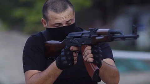 The security guards are trained to shoot guns at the shooting range. Stock Footage 95181659