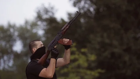 The security guards are trained to shoot guns at the shooting range. Stock Footage 95181914